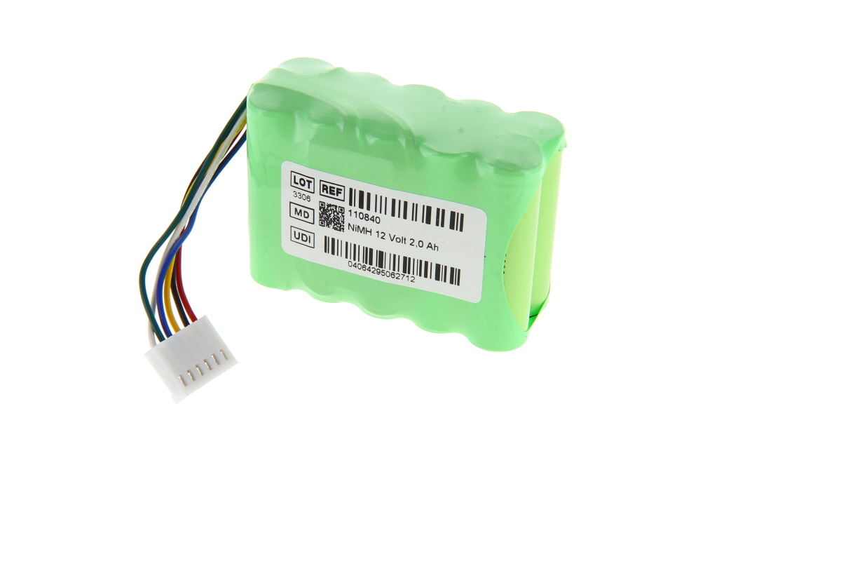 Light green NiMH battery, rectangular with rounded cells, in foil packaging. White label marked ‘NiMH 12 Volt 2.0 Ah’ and barcodes. Cable harness with multicoloured wires leading to a white multi-pin plug. For the Codan Argus infusion pump.